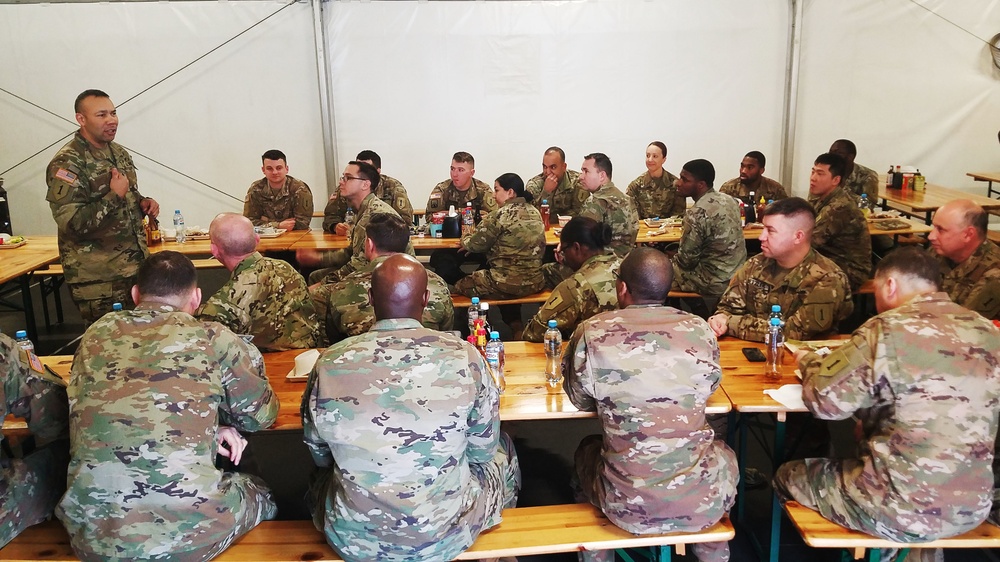 1st Infantry Division command sergeant major meets with troops while in Poland