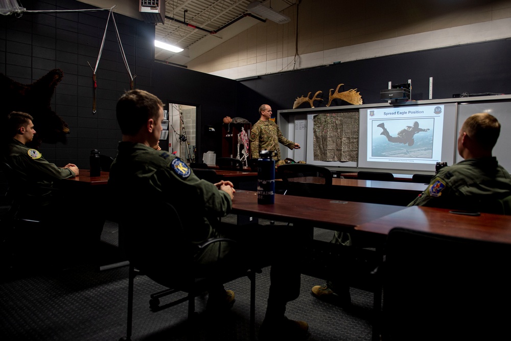 Emergency parachute training refreshes, assess aircrew