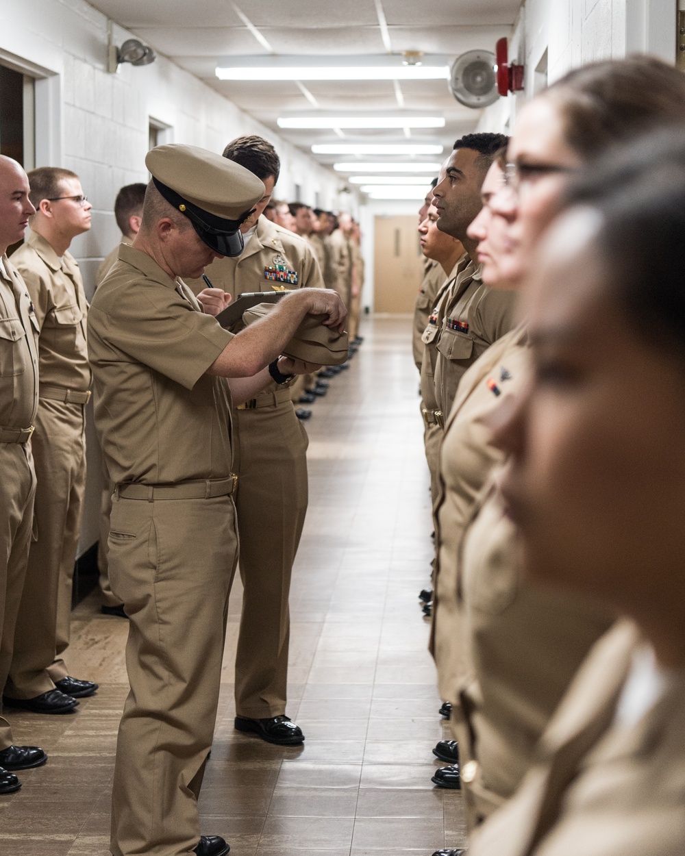 200226-N-TE695-0003 NEWPORT, R.I. (Feb. 26, 2020) -- Naval Science Institute Seaman-to-Admiral (NSI/STA-21) conducts a uniform inspection