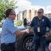 Guánica Mayor Greets FEMA employee at a VIP Tour