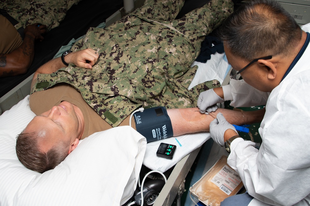 Sailors donate blood aboard Frank Cable