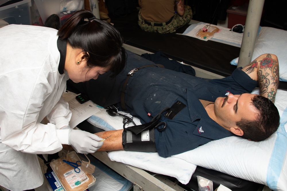 Sailors donate blood aboard Frank Cable