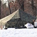 Cold-Weather Operations Course Class 20-03 students build Arctic tents during training at Fort McCoy