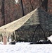 Cold-Weather Operations Course Class 20-03 students build Arctic tents during training at Fort McCoy