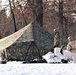 Cold-Weather Operations Course Class 20-03 students build Arctic tents during training at Fort McCoy