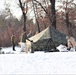 Cold-Weather Operations Course Class 20-03 students build Arctic tents during training at Fort McCoy