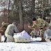 Cold-Weather Operations Course Class 20-03 students build Arctic tents during training at Fort McCoy