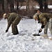 Cold-Weather Operations Course Class 20-03 students build Arctic tents during training at Fort McCoy