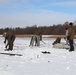 Cold-Weather Operations Course Class 20-03 students build Arctic tents during training at Fort McCoy