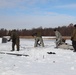 Cold-Weather Operations Course Class 20-03 students build Arctic tents during training at Fort McCoy