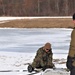 Cold-Weather Operations Course Class 20-03 students build Arctic tents during training at Fort McCoy