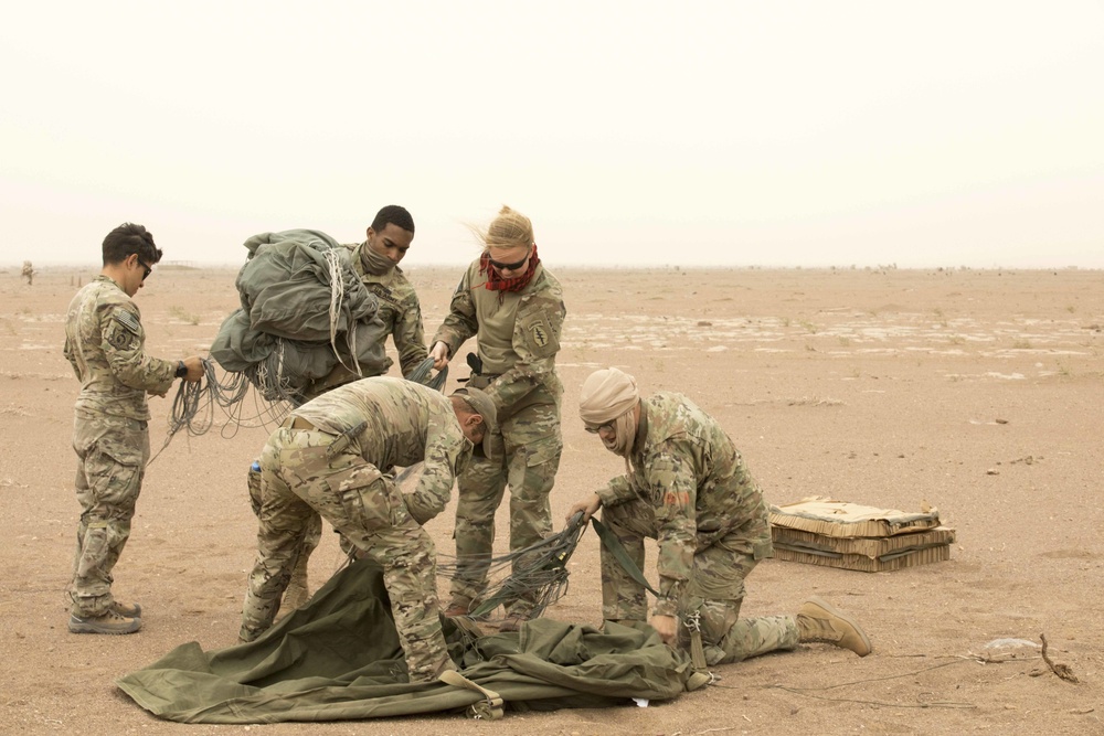 Service members train for medical supply drops at Flintlock 20