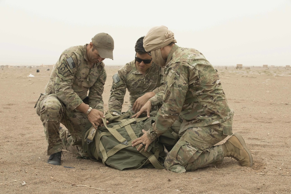 Service members train for medical supply drops at Flintlock 20