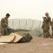 Service members train for medical supply drops at Flintlock 20