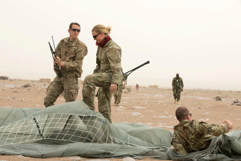 Service members train for medical supply drops at Flintlock 20
