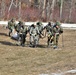 Cold-Weather Operations Course Class 20-03 students practice snowshoeing, ahkio sled use