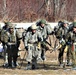 Cold-Weather Operations Course Class 20-03 students practice snowshoeing, ahkio sled use