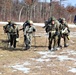 Cold-Weather Operations Course Class 20-03 students practice snowshoeing, ahkio sled use