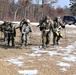 Cold-Weather Operations Course Class 20-03 students practice snowshoeing, ahkio sled use