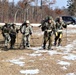 Cold-Weather Operations Course Class 20-03 students practice snowshoeing, ahkio sled use