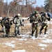 Cold-Weather Operations Course Class 20-03 students practice snowshoeing, ahkio sled use