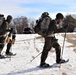 Cold-Weather Operations Course Class 20-03 students practice snowshoeing, ahkio sled use