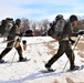 Cold-Weather Operations Course Class 20-03 students practice snowshoeing, ahkio sled use