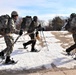 Cold-Weather Operations Course Class 20-03 students practice snowshoeing, ahkio sled use