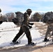 Cold-Weather Operations Course Class 20-03 students practice snowshoeing, ahkio sled use