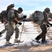 Cold-Weather Operations Course Class 20-03 students practice snowshoeing, ahkio sled use