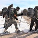 Cold-Weather Operations Course Class 20-03 students practice snowshoeing, ahkio sled use