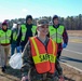 Members of the 177th Fighter Wing Student Flight Clean Up Base Perimeter