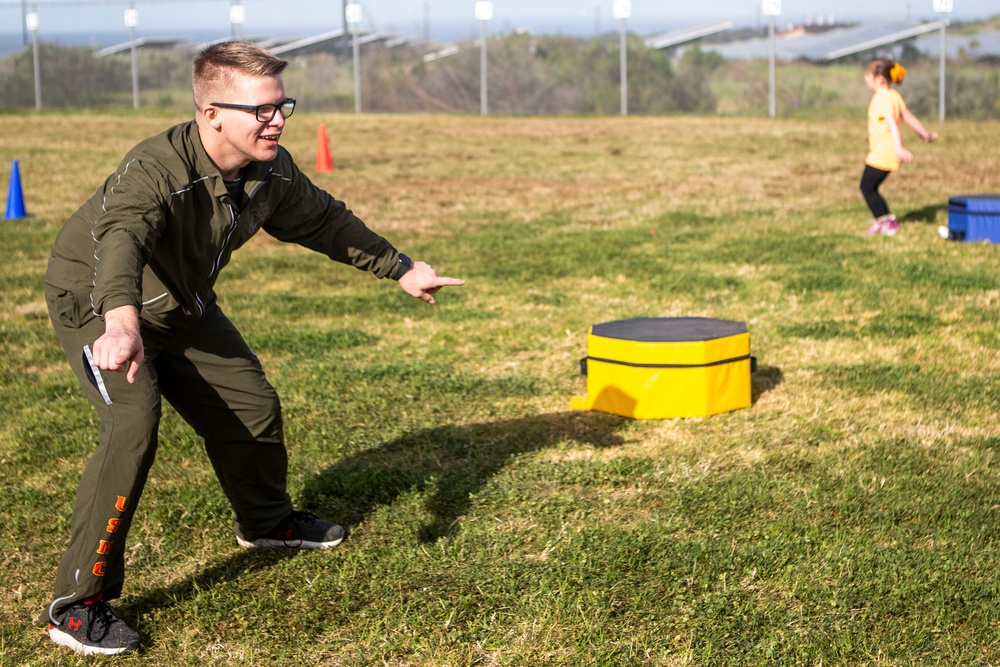 Marines lead elementary school students in PE challenge
