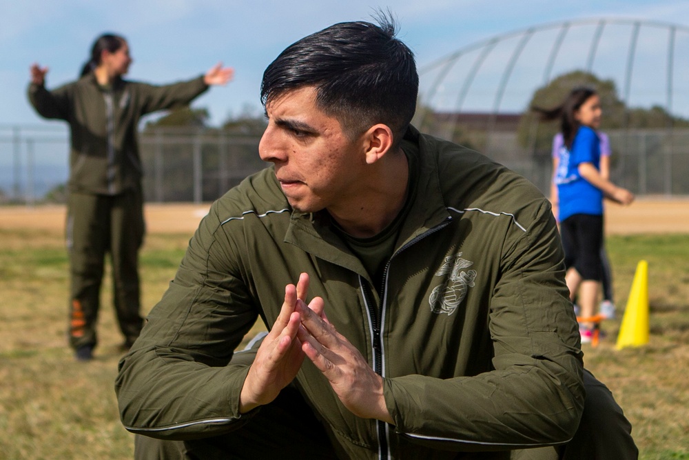 Marines lead elementary school students in PE challenge