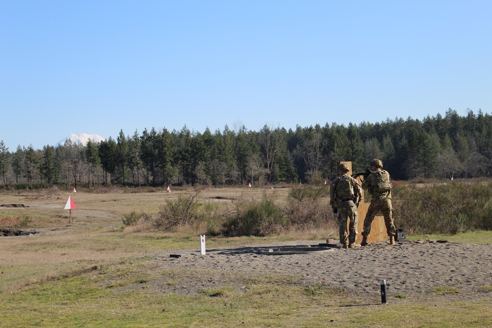 SFAB Advisor engages targets during new M4 rifle qualification