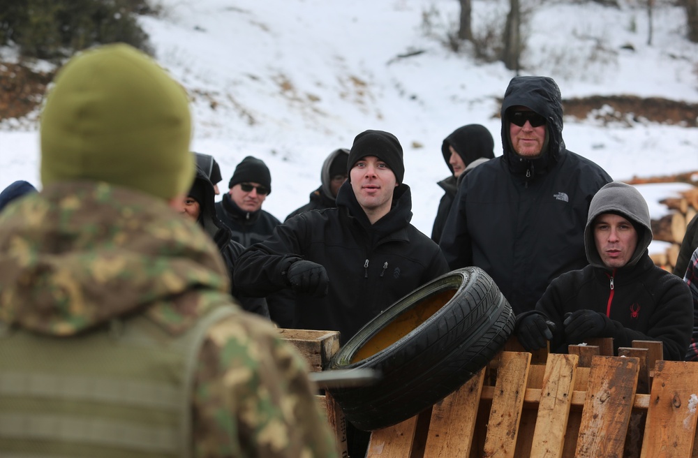 Romanian soldiers negotiate with role players