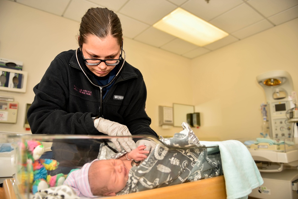 US Naval Hospital Naples Performs Post-Child Birth Procedures on Mother and Newborn Baby