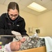 US Naval Hospital Naples Performs Post-Child Birth Procedures on Mother and Newborn Baby