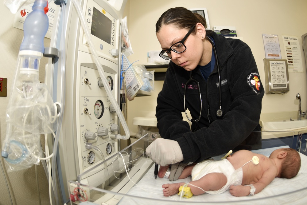 US Naval Hospital Naples Performs Post-Child Birth Procedures on Mother and Newborn Baby