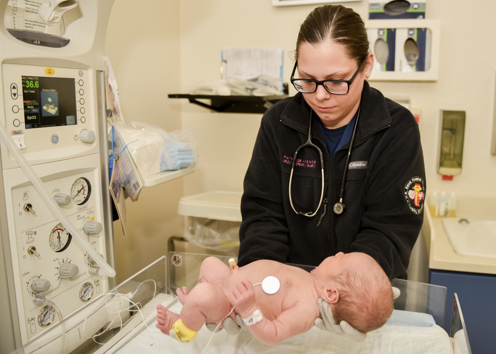 US Naval Hospital Naples Performs Post-Child Birth Procedures on Mother and Newborn Baby