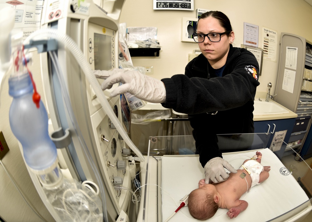 US Naval Hospital Naples Performs Post-Child Birth Procedures on Mother and Newborn Baby