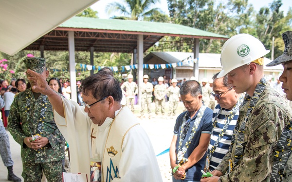 U.S. Navy Seabees with NMCB-5’s Detail Palawan attend the ribbon cutting ceremony at Malatgao Elementary School