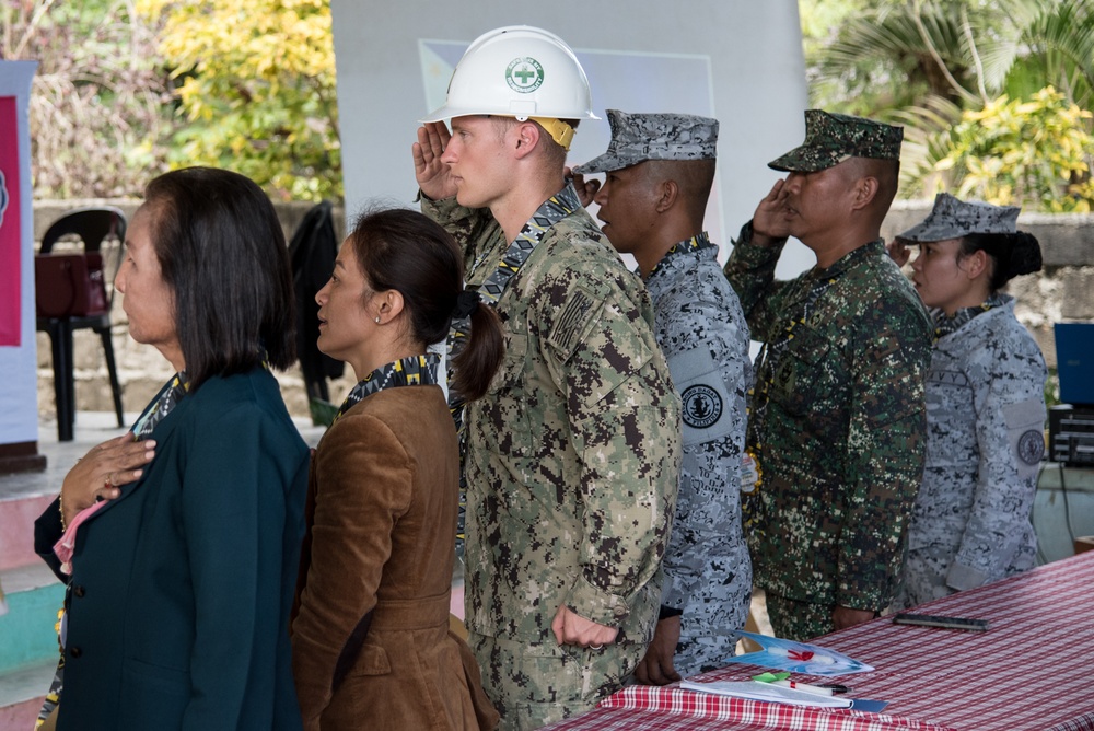 U.S. Navy Seabees with NMCB-5’s Detail Palawan attend the ribbon cutting ceremony at Malatgao Elementary School