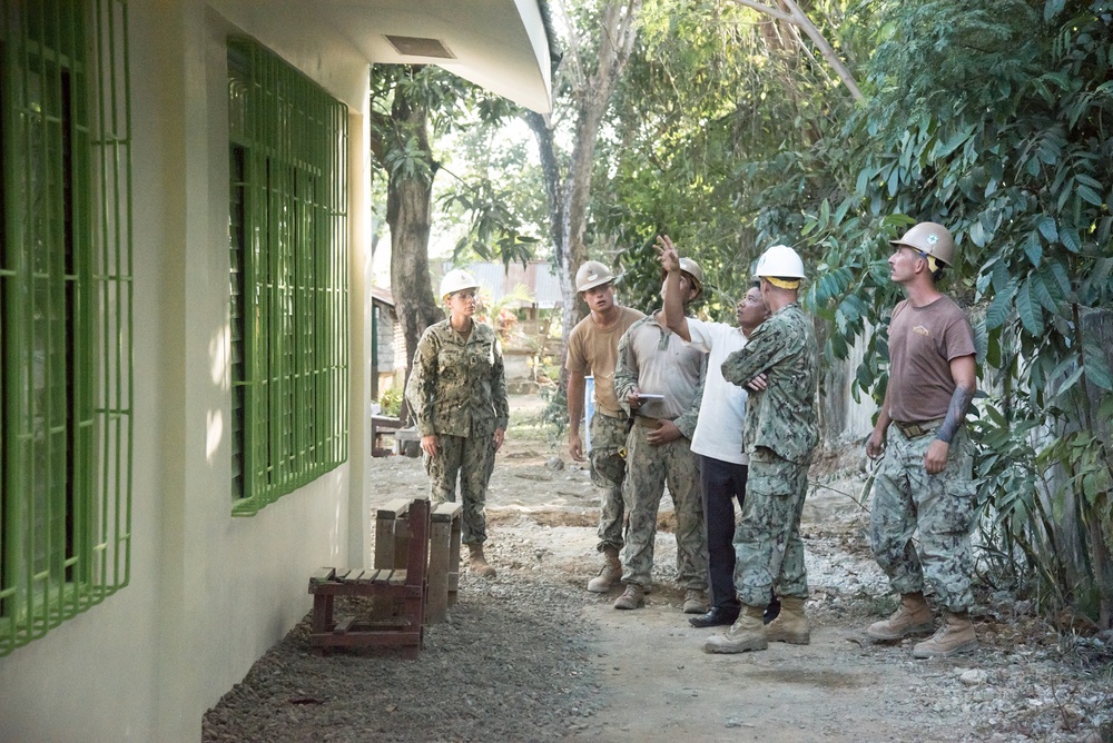 U.S. Navy Seabees with NMCB-5’s Detail Palawan attend the ribbon cutting ceremony at Malatgao Elementary School