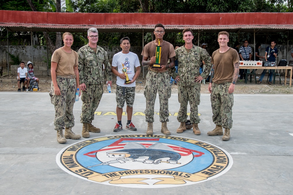 U.S. Navy Seabees with NMCB-5’s Detail Palawan attend the ribbon cutting ceremony at Malatgao Elementary School