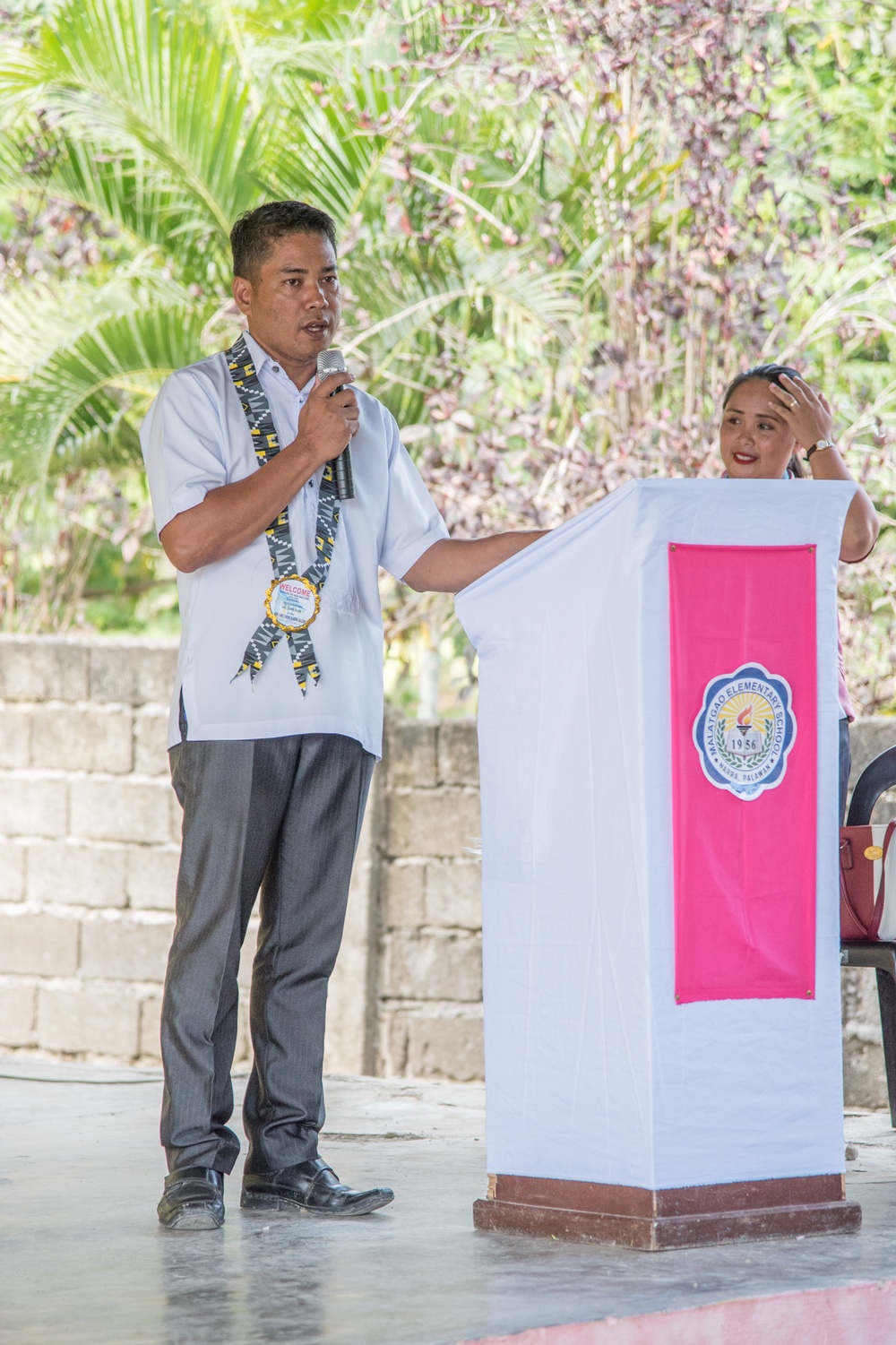 U.S. Navy Seabees with NMCB-5’s Detail Palawan attend the ribbon cutting ceremony at Malatgao Elementary School