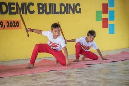 U.S. Navy Seabees with NMCB-5’s Detail Palawan attend the ribbon cutting ceremony at Malatgao Elementary School