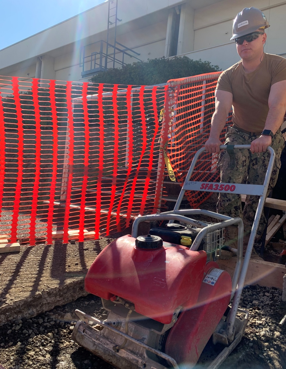 U.S. Navy Seabees deployed with NMCB-5's Detail Atsugi construct a loading dock at the Navy Exchange, Naval Air Facility Atsugi