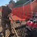U.S. Navy Seabees deployed with NMCB-5's Detail Atsugi construct a loading dock at the Navy Exchange, Naval Air Facility Atsugi