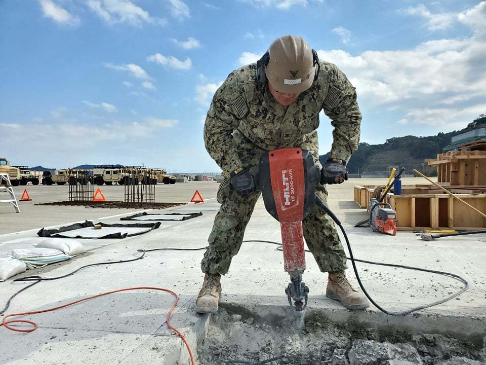 U.S. Navy Seabees with NMCB-5’s Detail Sasebo support Naval Beach Unit-7